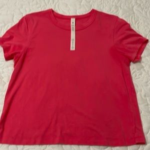 Lululemon pink shirt in great condition sold as is!